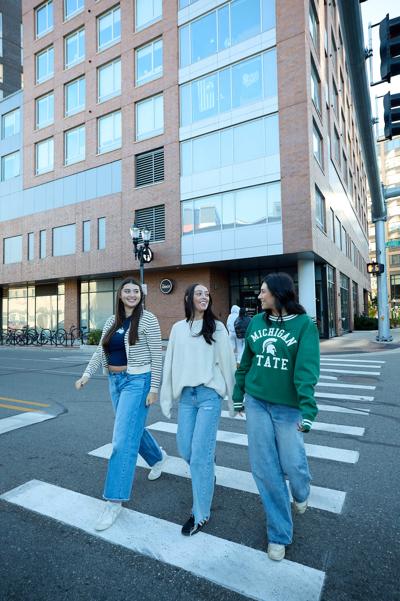 students walking across the street